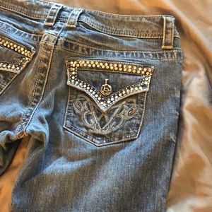 Skinny jeans by Bebe (with diamonds)